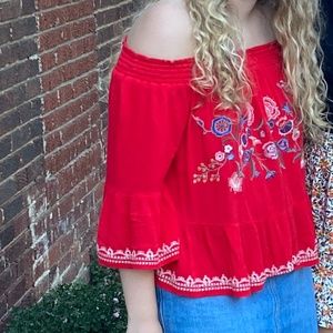 Red off the shoulder embroidered shirt